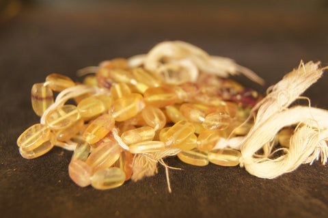Bead, clear tan (dyed), 10x5mm tube-C grade, Mohs hardness 2-12 to 6 - $0.50 per 2pc