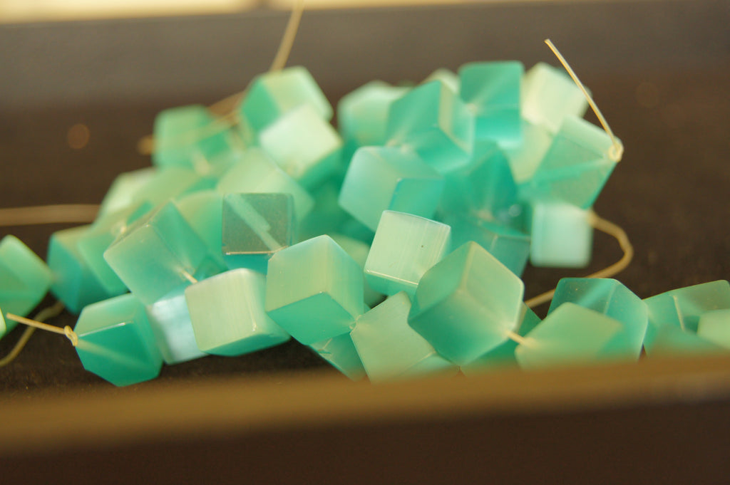 Bead, fire-polished, deep gloss sea green, 10mm cube - $0.50 per 3pc