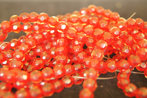 Bead, fire-polished glass, clear red, 4mm faceted round - $0.50 per 3pc