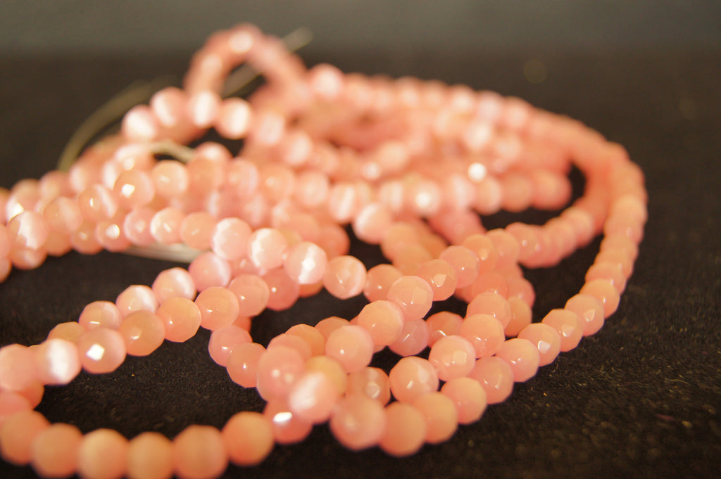 Bead, fire-polished glass, opaque pink, 4mm faceted round  - $0.50 per 3pc