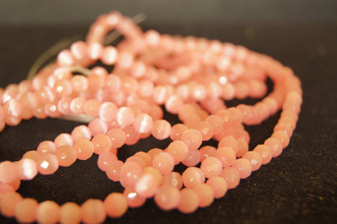Bead, fire-polished glass, opaque pink, 4mm faceted round  - $0.50 per 3pc