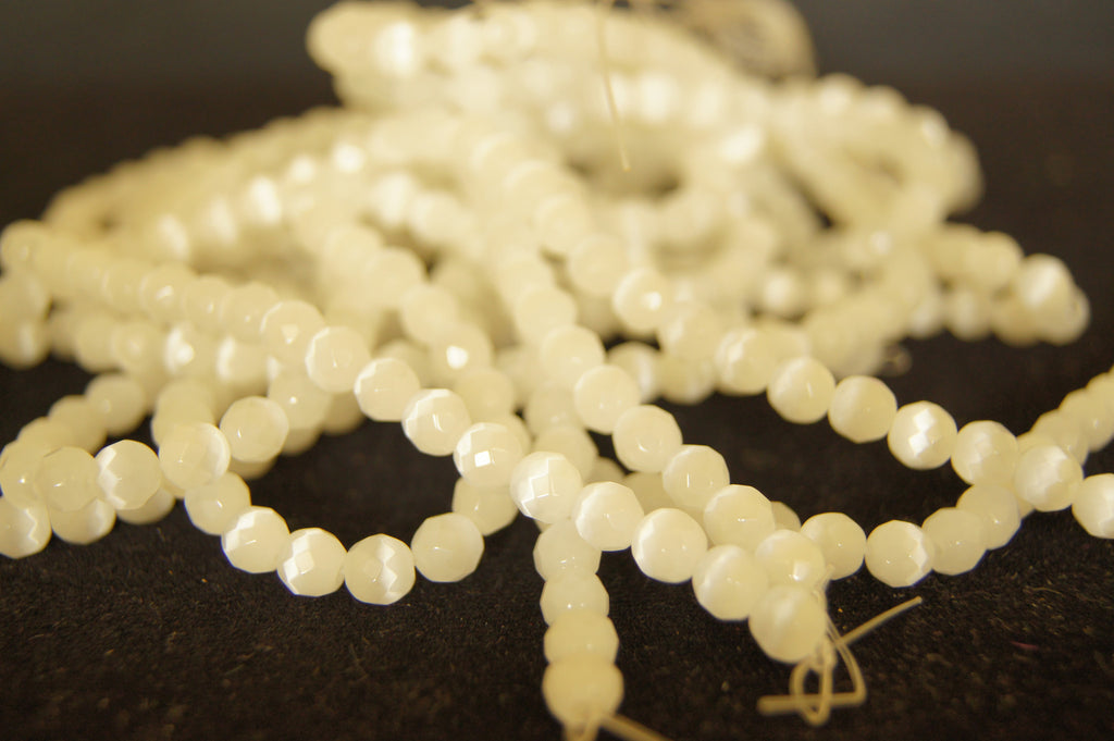 Bead, fire-polished glass, white alabaster, 4mm faceted round  - $0.50 per 3pc