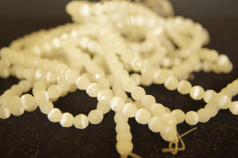 Bead, fire-polished glass, white alabaster, 4mm faceted round  - $0.50 per 3pc