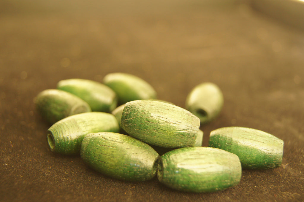 Bead, painted wood (coated), green textured,  hand-cut pattern - 2.5cm x 1cm - $0.5 per 5 piece