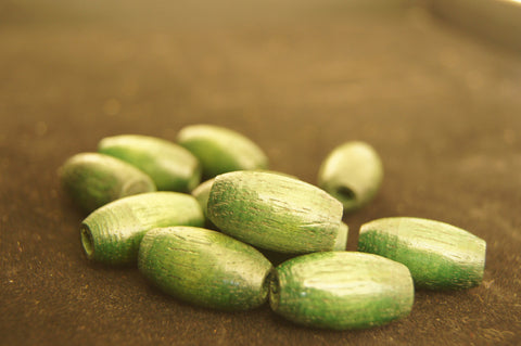 Bead, painted wood (coated), green textured,  hand-cut pattern - 2.5cm x 1cm - $0.5 per 5 piece