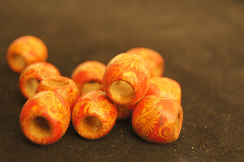 Bead, painted wood (coated), fire red textured hand-cut round with pattern - 1.5cm x 1.5cm