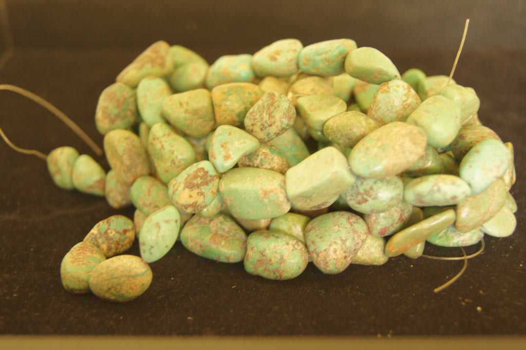 Bead, turquoise (dyed  stabilized), blue-green, small pebble, Mohs hardness 5 to 6 -Ave size 1cmx1.5cm - $0.50 per pc