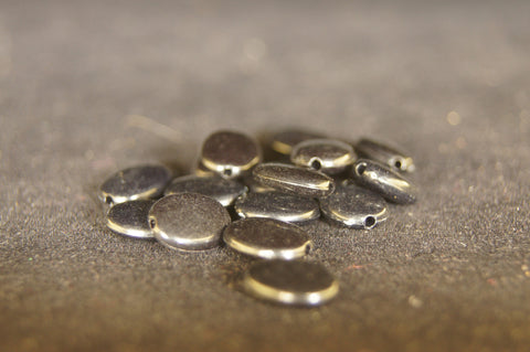 Plastic black glossy pea-shaped 1cm x 0.8cm - 3pc